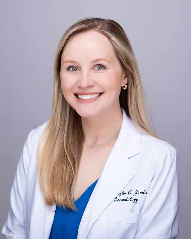 Dr. Jindia headshot with lab coat web